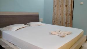 Voodi või voodid majutusasutuse Ashirbad Guest House toas