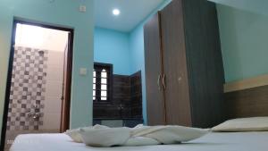 Voodi või voodid majutusasutuse Ashirbad Guest House toas