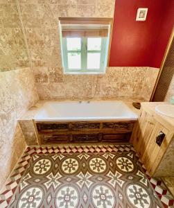 A bathroom at House on the Brooks Self catering Holiday let South Downs West Sussex Sleeps 14