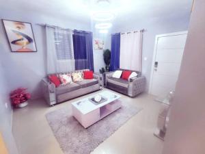 a living room with two couches and a coffee table at a life time memories in a dream vacation home in Mendoza