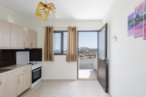 Kuchyň nebo kuchyňský kout v ubytování FabView Studio Apartments