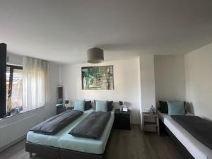 Postel nebo postele na pokoji v ubytování Hotel Hegemann garni