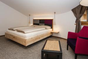 Posteľ alebo postele v izbe v ubytovaní Hotel Gasthof Höllriegl