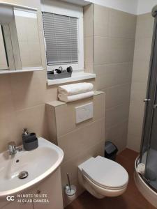 Kúpeľňa v ubytovaní Apartmán Na zjazdovke, chata Borovica, Valča