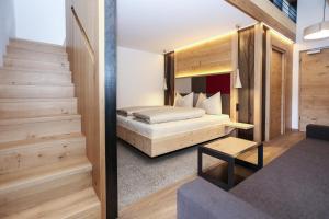 Posteľ alebo postele v izbe v ubytovaní Hotel Gasthof Höllriegl