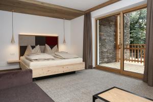 Posteľ alebo postele v izbe v ubytovaní Hotel Gasthof Höllriegl + 37 fotografií