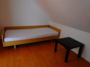 Postel nebo postele na pokoji v ubytování Apartmán Strážný