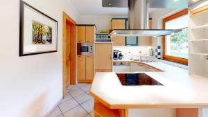 Kuchyň nebo kuchyňský kout v ubytování Ferienhaus Monz + 12 fotografií