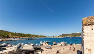a view of a marina with boats in the water at Central Seaside Residence in Vis