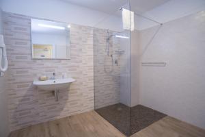 Koupelna v ubytování Hotel Astoria