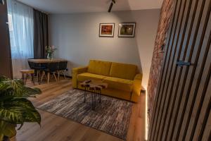 Posedenie v ubytovaní Bison Apartamenty