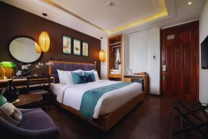 Ένα ή περισσότερα κρεβάτια σε δωμάτιο στο Hotel Emerald Waters Classy