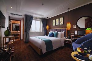 Ένα ή περισσότερα κρεβάτια σε δωμάτιο στο Hotel Emerald Waters Classy