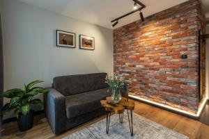 Posedenie v ubytovaní Bison Apartamenty