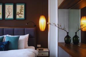 Ένα ή περισσότερα κρεβάτια σε δωμάτιο στο Hotel Emerald Waters Classy