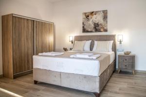 Postel nebo postele na pokoji v ubytování STELLA luxury villa - Kamilari + 38 fotografií