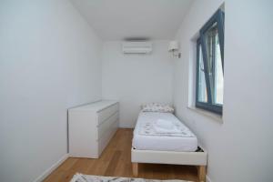 Posteľ alebo postele v izbe v ubytovaní Villa Rialto