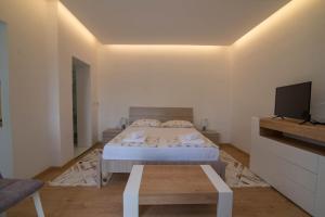 Posteľ alebo postele v izbe v ubytovaní Villa Rialto