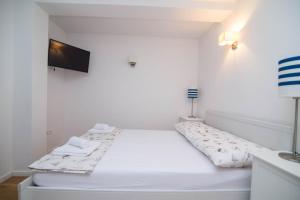 Posteľ alebo postele v izbe v ubytovaní Villa Rialto