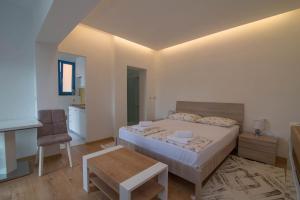 Posteľ alebo postele v izbe v ubytovaní Villa Rialto