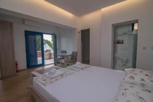 Posteľ alebo postele v izbe v ubytovaní Villa Rialto