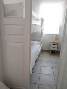 Posteľ alebo postele v izbe v ubytovaní Rosolio + 16 fotografií