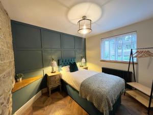 Mulberry House - Morpeth Town Centre - Hot Tub tesisinde bir odada yatak veya yataklar