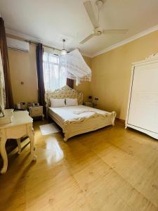 Postel nebo postele na pokoji v ubytování Boshowa Villas