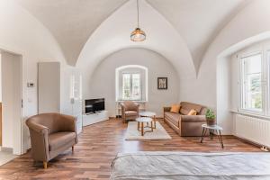 Posezení v ubytování Ferienwohnungen im Kloster