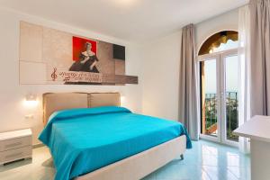 A bed or beds in a room at Casa vacanze Luigi e Rachele