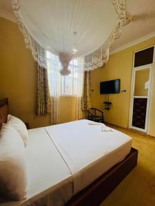 TV a/nebo společenská místnost v ubytování Boshowa Villas