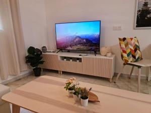 En tv och/eller ett underhållningssystem på Apartamento Málaga Centro
