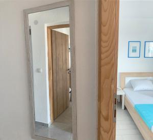 Rúm í herbergi á ORA apartments