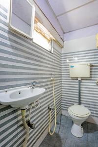Ванна кімната в HOTEL GOLDEN PLAZA