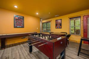 a game room with a foosball table and chess at A Majestic Hilltop chalet in Gatlinburg