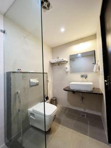 Koupelna v ubytování Hotel MK Grand