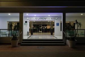 a building with a entrance to aausijoscoazaazaazaazaark at AluaSun Costa Park in Torremolinos