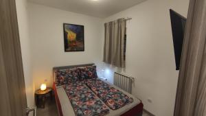 Posteľ alebo postele v izbe v ubytovaní APARTMENT NEVERA