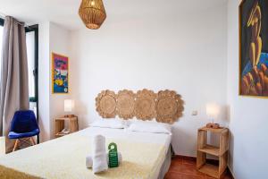 Postel nebo postele na pokoji v ubytování Hotel Doña Matilde
