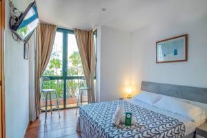 Postel nebo postele na pokoji v ubytování Hotel Doña Matilde