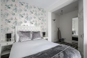 Postel nebo postele na pokoji v ubytování Sefton Park Hotel