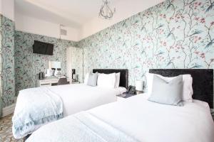 Postel nebo postele na pokoji v ubytování Sefton Park Hotel