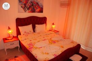Postel nebo postele na pokoji v ubytování Atamert hıgh class