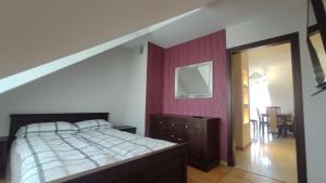 Łóżko lub łóżka w pokoju w obiekcie Apartament Prosta Kielce KLIMATYZACJA