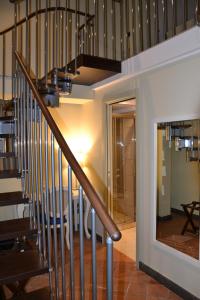 a staircase in a house with a stair case at Art & Jazz Hotel in Catania
