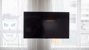 TV a/nebo společenská místnost v ubytování Thingholt by Center Hotels