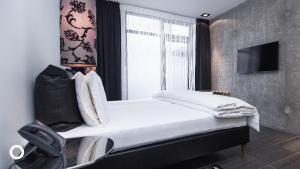 Postel nebo postele na pokoji v ubytování Thingholt by Center Hotels