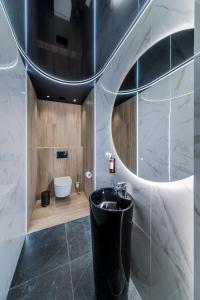 Kúpeľňa v ubytovaní H Aparthotel