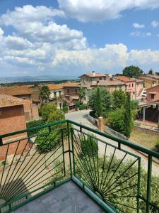 a view of a city from a balcony at Villa Mezzetti in Petrignano sul Lago