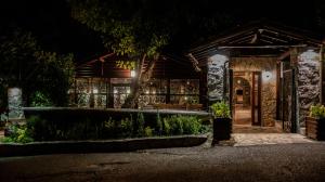 a house at night with the front door lit up at Fener Motel in Şile